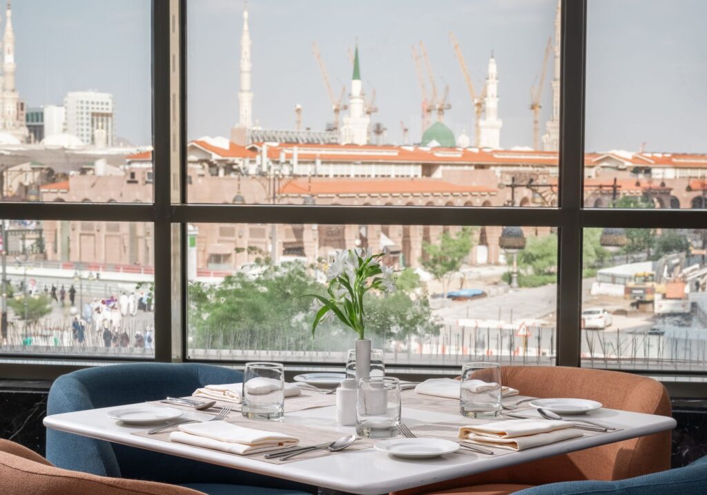 Dining table with a view of Al-Masjid an-Nabawi
