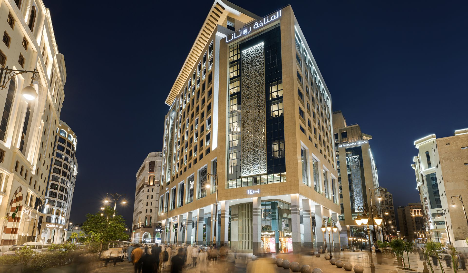 Al Manakha Rotana facade at night