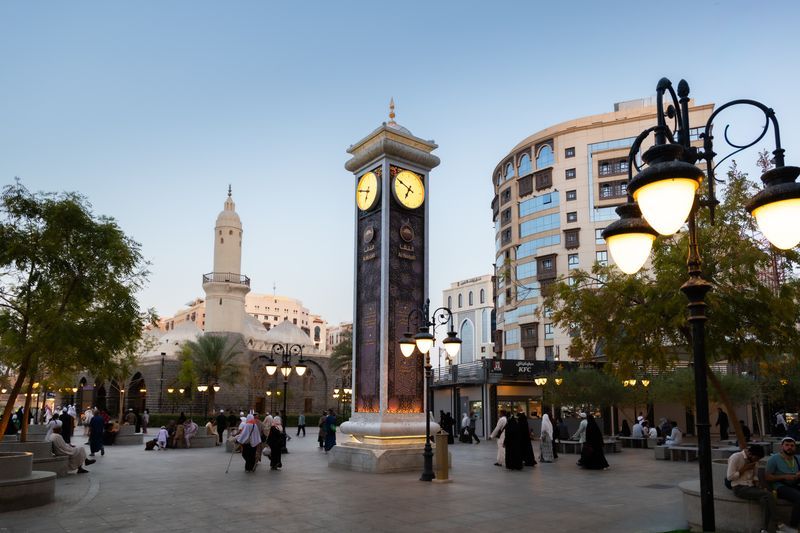 Plaza and movement in Madinah near historic landmarks